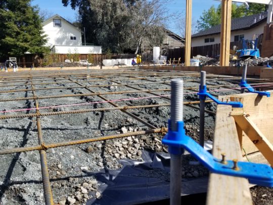 Foundation construction with steel reinforcement and concrete formwork